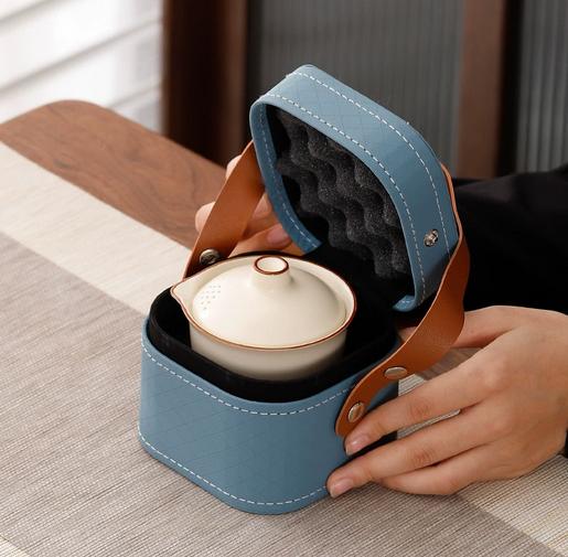 Portable travel tea set with one pot and three cups