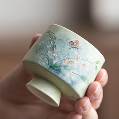 Hand-painted Oncidium ceramic teacup