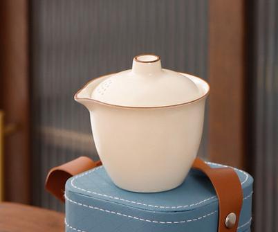 Portable travel tea set with one pot and three cups