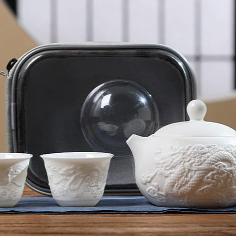 Embossed mutton-fat jade Xishi pot