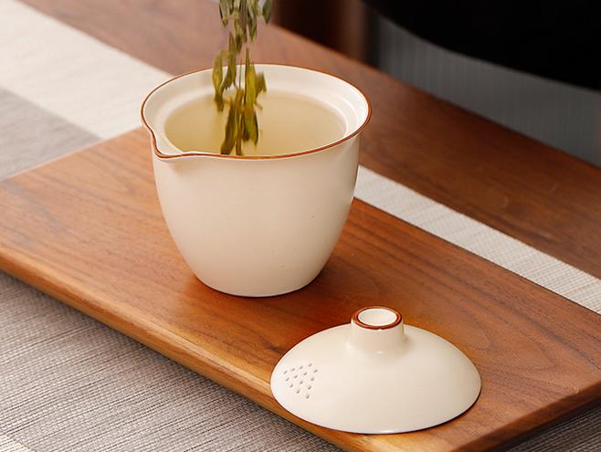 Portable travel tea set with one pot and three cups