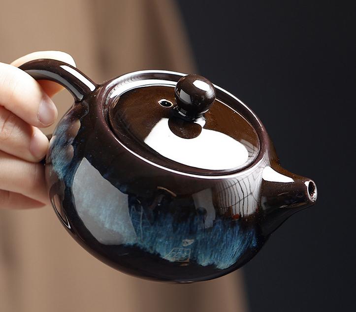 Kiln-changed gold sand ceramic tea set with one pot and six cups