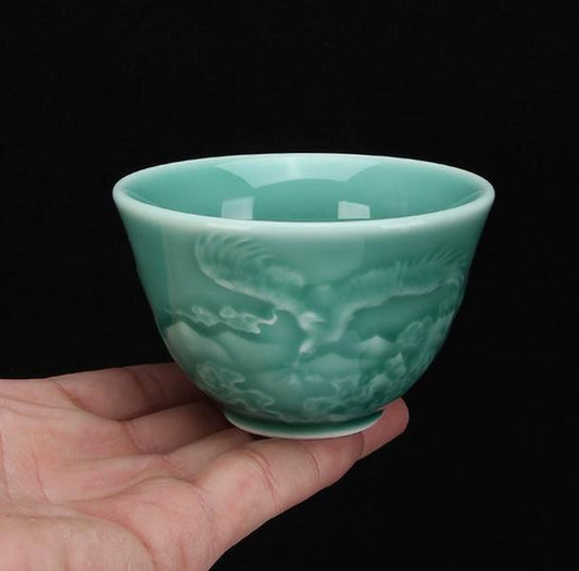 Celadon relief dragon plum green host cup